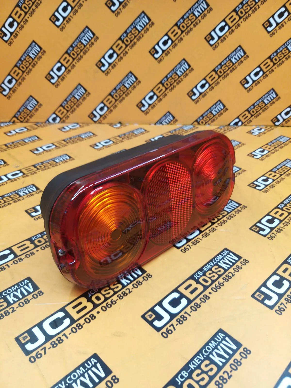 700/50018, 700/50130 Ліхтар задній JCB 3CX, 4CX